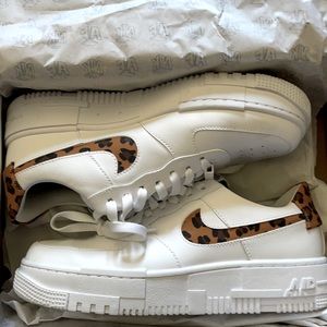 Nike Air Force 1’s w/Leopard print Nike symbol